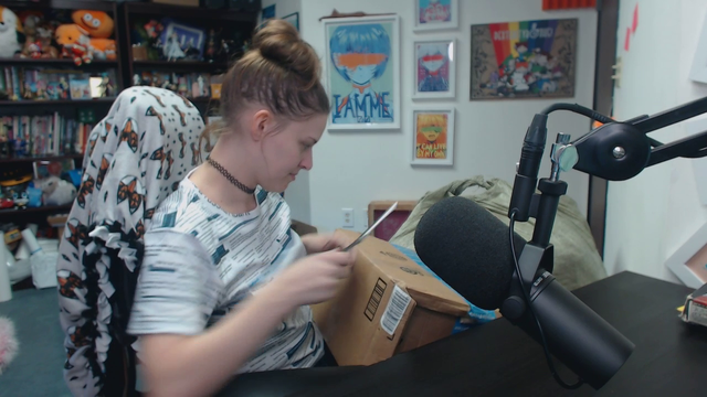 Dodger hits herself in the face during an unboxing