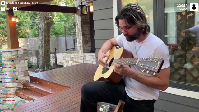 Cyr plays his guitar for Tectone