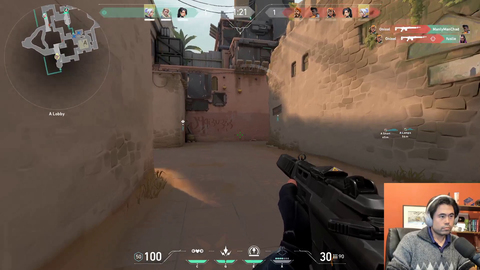 Hikaru peeking and moving his body in sync with the game