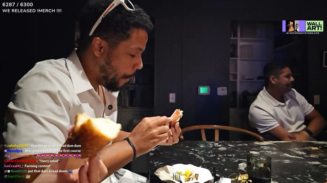 Grown woman eating in a fancy restaurant.
