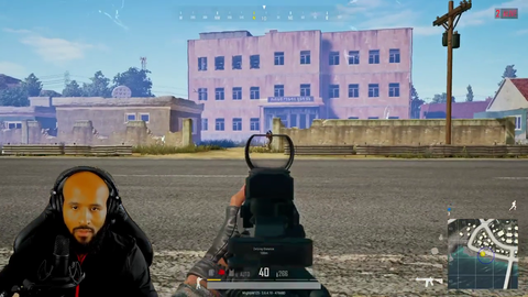 UFC Champion Demetrious Johnson celebrates a win in PUBG but forgets he just had a shoulder surgery