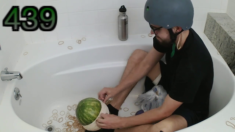 439 rubber bands to pop a watermelon