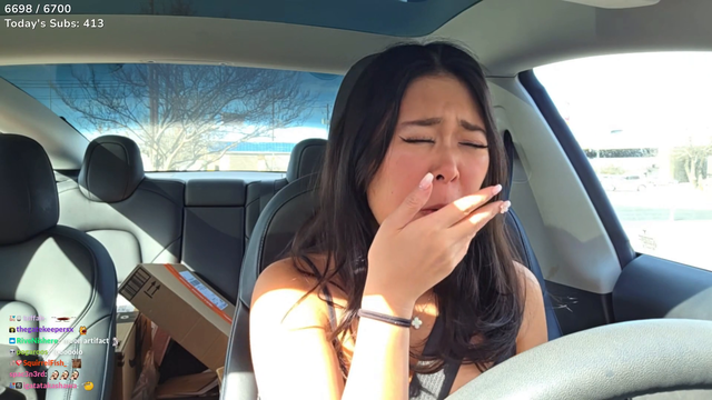 Emily tried eating Sour Pickle Balls for the first time
