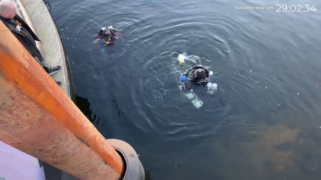 Divers found the lost phone in water! and it still works