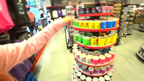 Hachu gets the attention of staff in gift store