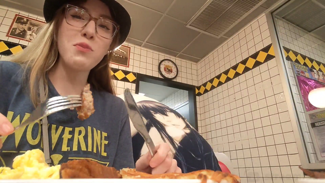 Streamer attempts to feed "boyfriend" at waffle house.