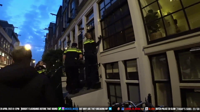 Police raiding a house in Amsterdam