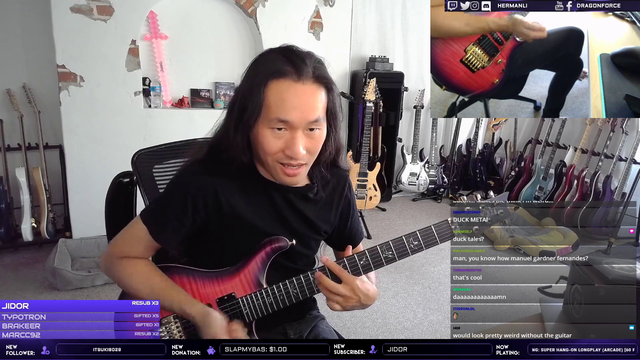 Herman Li from Dragonforce shows the whammy bar is hard work