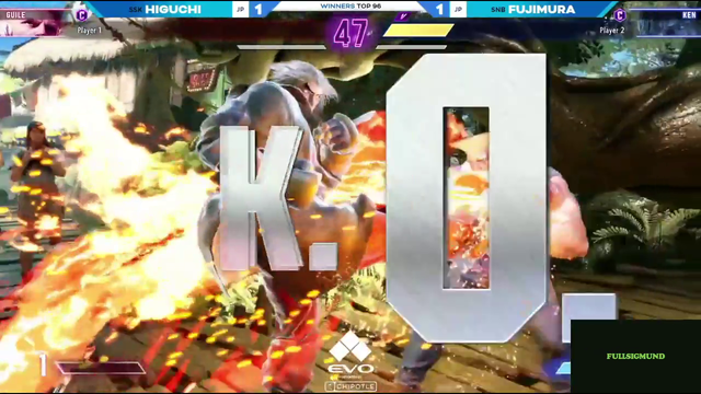 2 japanese players shake hands at EVO