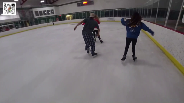 Erobb ignores an ice skater falling