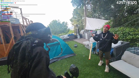 Faze Kaysan destroys Lacy's setup with a baseball bat and a paintball gun after he ripped his 10k$ Pokemon card