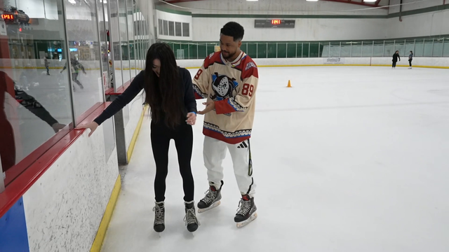 Nick teaches Katchii how to skate