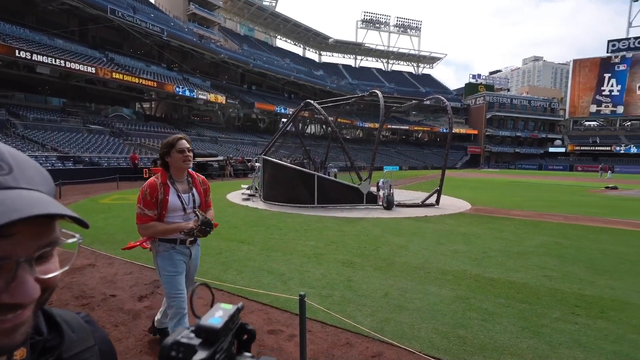 Emiru practices throwing the first pitch at Petco Park