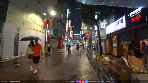 The Angel of Shibuya Saves Two Maidens From the Rain