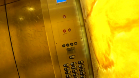 Raided while stuck in an elevator . . .