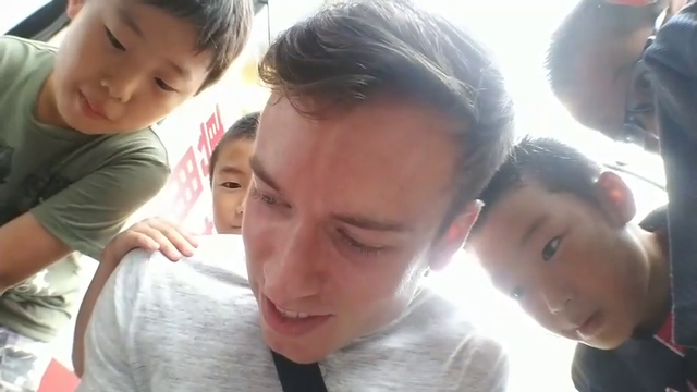 Jake gets swarmed for an autograph in Japan