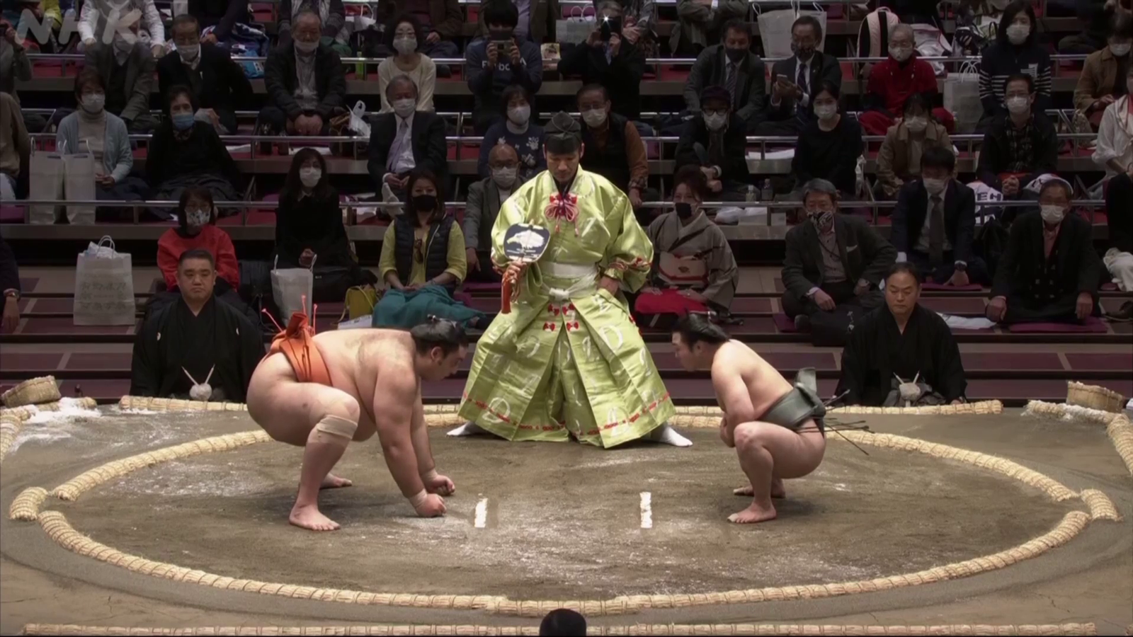 Crazy Sumo Wrestler Tries to Jump over Competitor