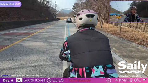 Kind Korean Uncle stops his car to offer SarahBridgewater a Pocari Sweat while she's cycling through Korea