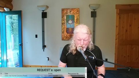 Twitch CEO on the mic singing Country Roads