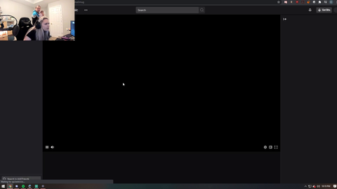 Erobb's girlfriend watches one of his old clips