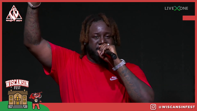 T-Pain proposes a toast after the Mayor of Milwaukee announces T-Pain Day (6/11) at WiscansinFest