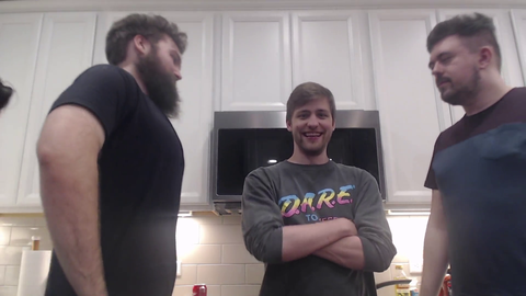 A twink between 2 gigantic beasts