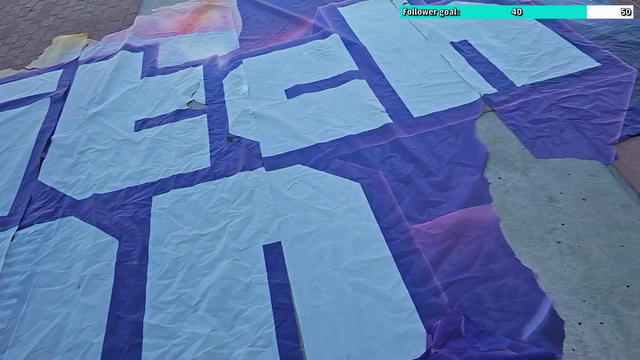Unhinged streamer summons Dan Clancy by reconstructing TwitchCon banner from the trash