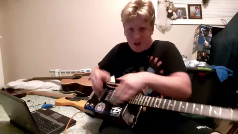 Small streamer absolutely shreds on an oil can turned guitar