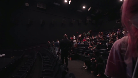Audience member at QT's event pours milk all over the theater