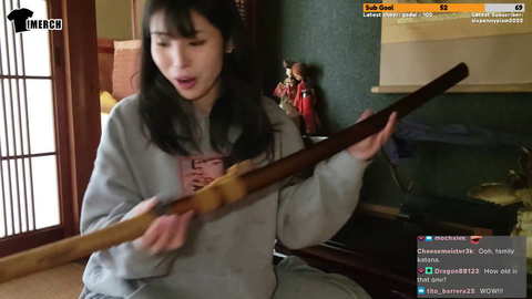 Meowko shows off her old family katana