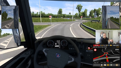 lamont learns how to drive a semi around a roundabout