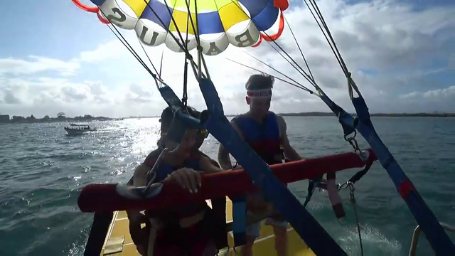 Jake goes parasailing