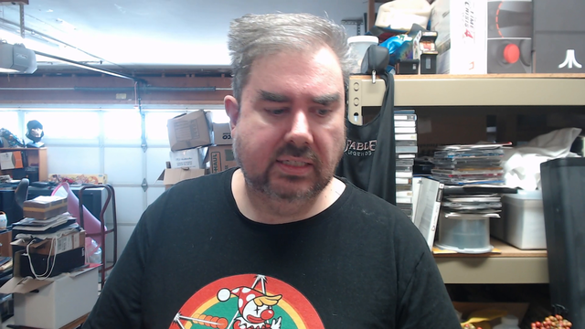 Jeff shows old Manhunt merch
