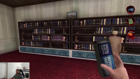 Lamont checking out the library