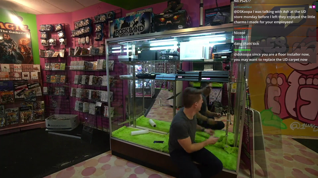 Video Game Store Owner just trying to fix the console case.