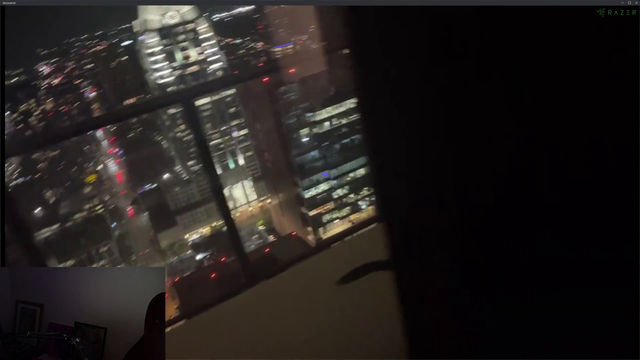 Soda showing the view from his Penthouse Apartment