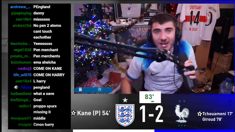 England fan watching Harry Kane's penalty miss vs France