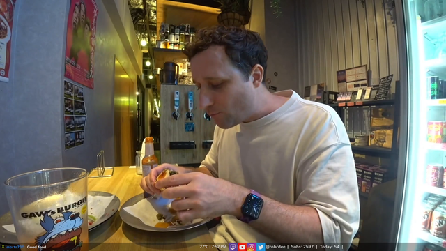 Rob devours a taco